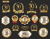 Anniversary golden laurel wreath and badges vector collection