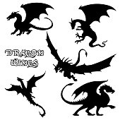 Black stylized vector illustrations of dragons silhouettes symbol in the form of a dragon on a white background