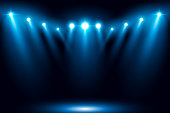 Blue stage arena lighting background with spotlight
