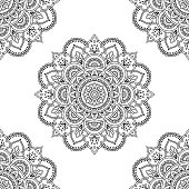 Circular pattern in form of mandala for Henna, Mehndi, tattoo, decoration. Seamless decorative ornament in ethnic oriental style. Coloring book page.