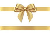 Decorative golden bow with horizontal ribbon isolated on white background.