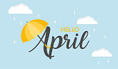 Hello April vector background. Cute lettering banner with clouds and umbrella illustration. April showers.