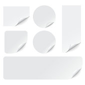 Paper stickers with curled corners on white background. Vector