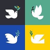 Peace dove. Flat style vector icon or logo template of white pigeon with olive branch. Set of elegant birds