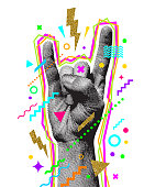 Rock'n'roll or Heavy Metal hand sign. Engraved style hand and multicolored abstract elements. Vector illustration.
