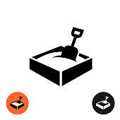 Sandbox icon. Black sign with color and inverted versions.