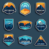 Set of nine mountain travel emblems.