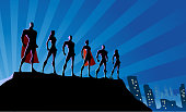 Vector Superhero Team Silhouette in The City Stock Illustration