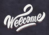 Welcome. Chalkboard vector lettering sign.