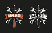 Workshop retro logo with wrench, screwdriver and heraldic ribbon