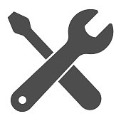 Wrench and screwdriver solid icon, labour day concept, repair equipment sign on white background, screwdriver and wrench icon in glyph style for mobile and web design. Vector graphics.